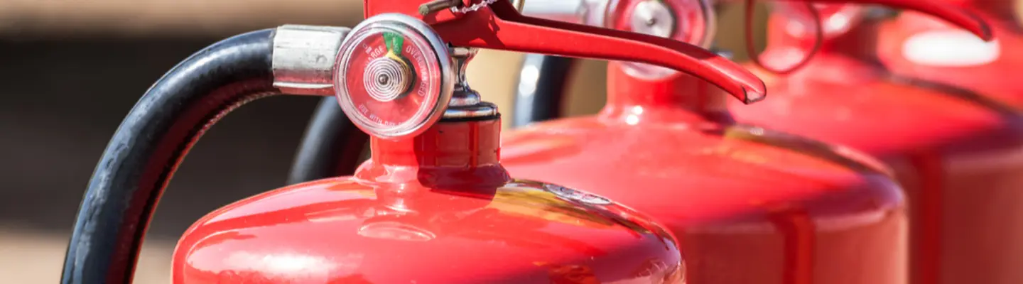 line of fire extinguishers