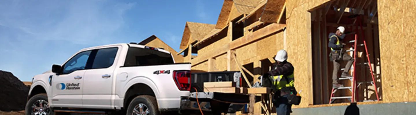 Ford truck outside residential construction site