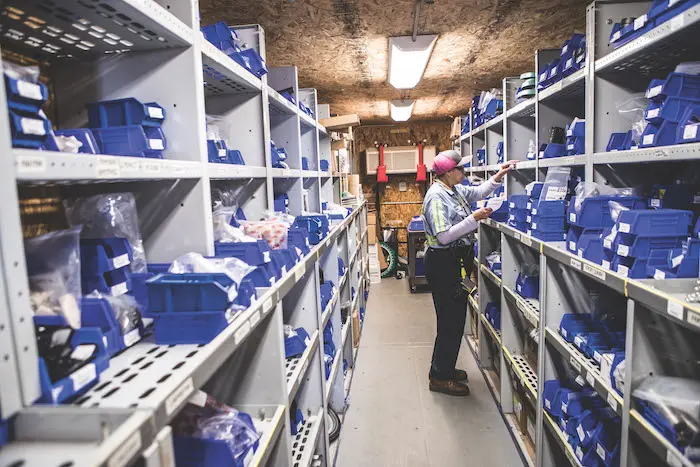 worker in tool storage room