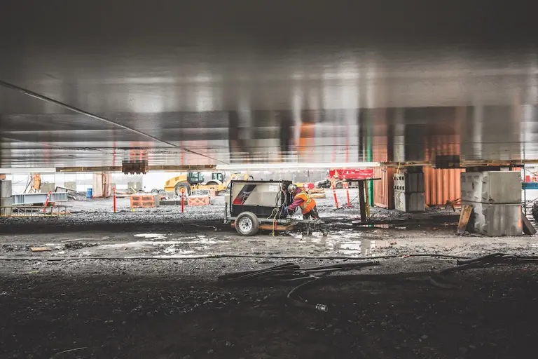 man at generator on worksite