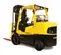 Rear angled view of a yellow Hyster warehouse forklift with black tires, a propane tank, extended forks and an open cabin.