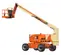 Side angled view of an orange and beige JLG Lift boom lift with extended arm and basket.