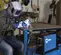 Blue and black MILLERELEC Arc Welder, 150-Amp TIG Inverter, 115/230V, Electric Powered