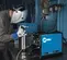 Blue and black MILLERELEC Arc Welder, 200-Amp TIG Inverter, Portable DC, Electric Powered