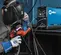 Blue and black MILLERELEC Arc Welder, 200-Amp TIG Inverter, Portable DC, Electric Powered