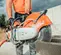 Orange, whie and black STIHL Concrete Cut-off Saw, 14 in., Gas Powered