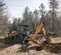 Orange and black CASE 90-105 HP Backhoe Loader, 14-16 ft. Dig Depth, Extendahoe
