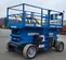 2014 Genie GS-4390 RT Rough Terrain Scissor Lift