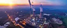 power plant at sunset