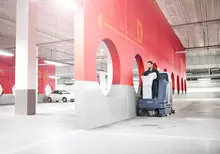 Scrubber in use parking lot