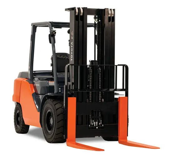 Front angled view of an orange and black warehouse forklift with extended forks and an open cabin. 